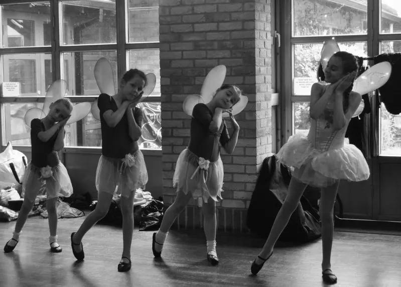 Black and white rehearsal shot of ballet and theatre craft pupils in Harlow