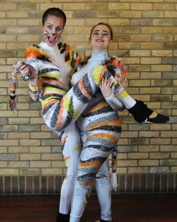 Pupils in tiger costumes for a theatre craft production in Harlow