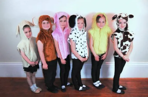 Junior pupils in animal costumes for an annual Harlow dance show