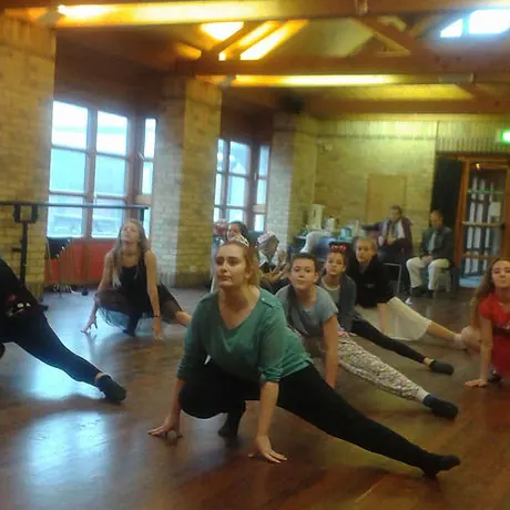 Pupils stretching at the start of a dance class in Harlow